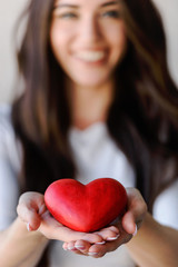 Red Heart on Woman's Palms. Womans love, Valentines day.