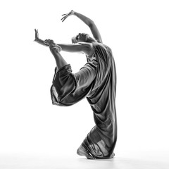 Beuatiful female dancer. White background