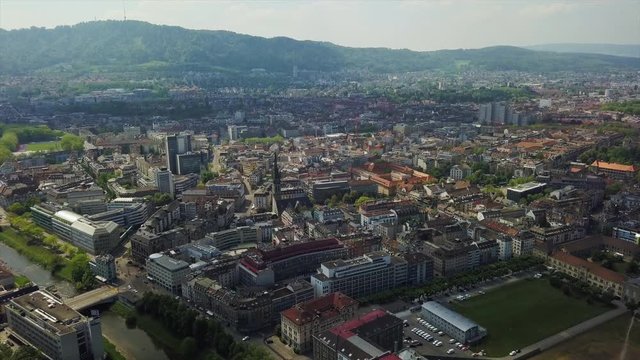 sunny zurich riverside cityscape aerial panorama 4k switzerland
