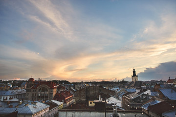 Fototapeta na wymiar A view from rooftop on Lviv city skyline