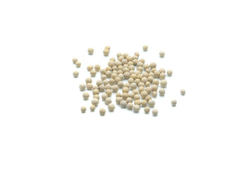 white Pepper seeds in wooden spoon