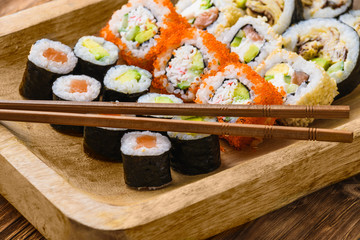 Sushi on a wooden table.