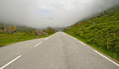Fototapeta na wymiar Scenic road in dramatic landscape of Norway