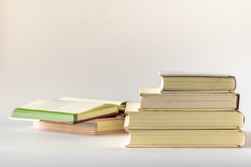 Stack of old books isolated on white background. 