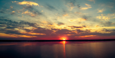 Aerial panoramic view of sunset on the lake