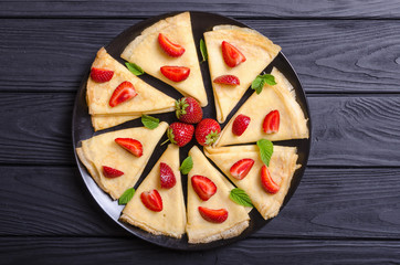 Homemade Russians pancakes with strawberry