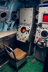 Machines and mechanisms inside navy ship. Old technologies. Military gears