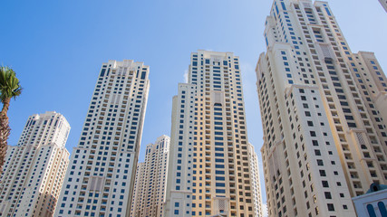 Fototapeta na wymiar The Dubai Marina promenade. Near marina mall. View on skyscrapers at day time. 