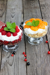 Dessert cups of Pecheneg, cottage cheese, raspberry, and apricot