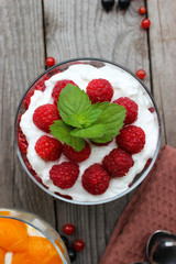 Dessert cups of Pecheneg, cottage cheese, raspberry, and apricot