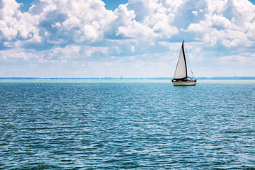 Sailing yacht in the turquoise sea, beautiful landscape