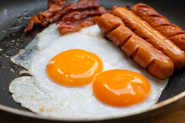 fried egg bacon and sausage