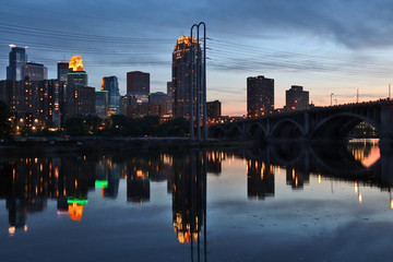 Urban city architecture background. Minneapolis downtown skyline and Third Avenue Bridge above...