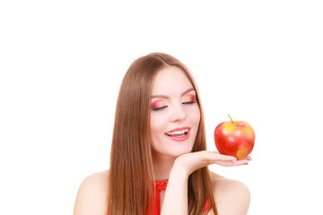 Woman charming girl colorful makeup holds apple fruit