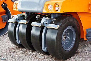 Rubber wheeled roller