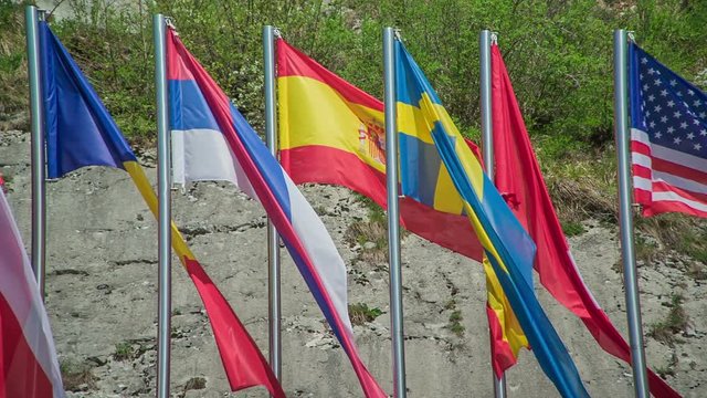 Different Flags Are Flapping In The Wind. It's A Really Nice Day.