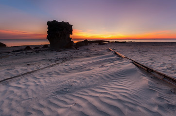 view of beautiful sunset seascape at Kudat, Sabah Malaysia. soft focus due to long expose.