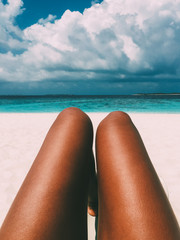 Maldives island luxury resort beach with a woman legs © DavidPrado