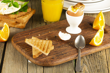 Scrambled eggs with herbs on wheat-rye crispy bread, homemade