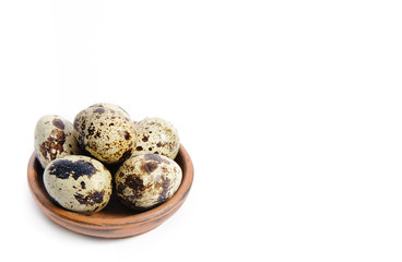 Fresh quail eggs in a bowl