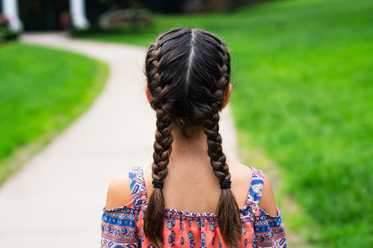Back view of girl with braids