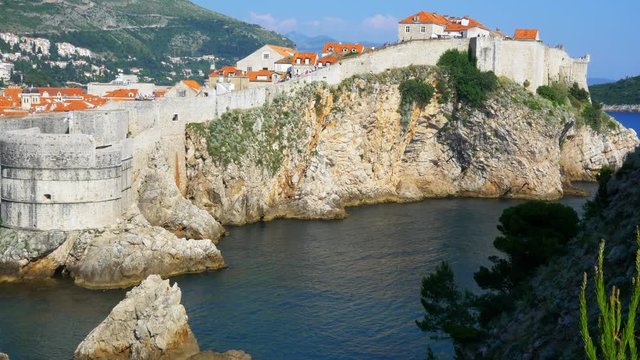Wide shot of the cliffs and walls of Dubrovnik.