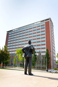 Tomas Bata statue across street from Batas skyscraper 21 in Zlin, Moravia, Czech Republic