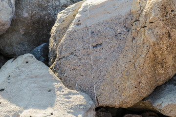 Large rocks on the shore of the Mediterranean Sea.