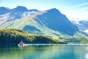 Ferry to Svartisen glacier seen from route Fv17, Norway