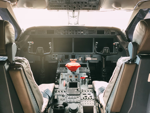 Interior of a pilot cockpit cabin private jet