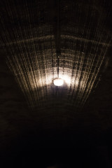 dark and sharp light of a lamp