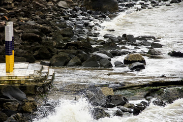 Trapped beach with rocks around