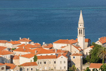 Fototapeta premium View of the rooftops and the bay of Budva in Montenegro