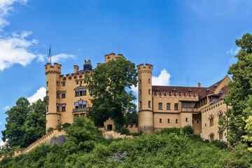 Naklejka premium Schwangau, Germany June 10, 2018: Hohenschwangau Castle or Schloss Hohenschwangau is a 19th-century palace in Bavaria in southern Germany. It was the residence of King Ludwig II of Bavaria.