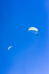 Parachutist Jumper in the blue sky