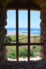 View from the barred window of a medieval fortress