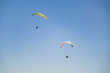 Parachutist Jumper in the blue sky