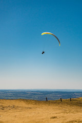 Parachutist Jumper in the blue sky