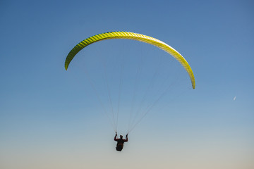 Parachutist Jumper in the blue sky