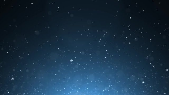 Realistic snowfall on abstract blue copy space background.