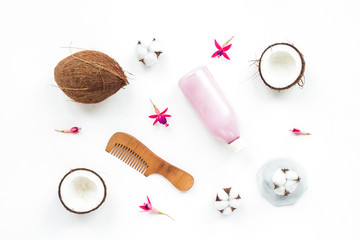 Fototapeta na wymiar Hair care composition. Coconut, brush, scissors on white background, flat lay, top view