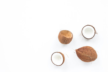 Coconut on white background, flat lay, top view
