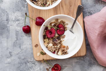 yogurt, breakfast, cherry, dairy, berries, dessert, cereal, flat, background, berry, bowl, cherries, copy space, diet, eating, fitness, food, fresh, fruit, granola, greek yogurt, health, healthy, hone