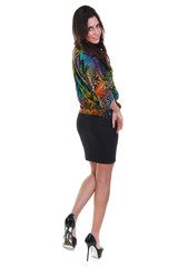  Young brunette woman in a black skirt and a colored blouse