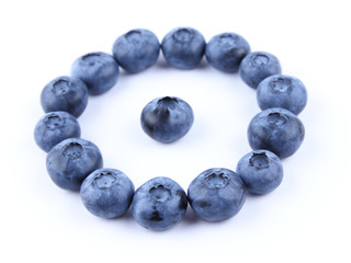 Blueberries on white background, blueberry berries isolated, blue berries close-up, blank for designer, vegetarian food for breakfast
