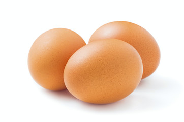 raw chicken eggs isolated on white background