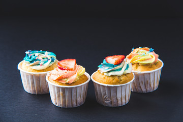 Banana cupcake with strawberry in Dark lighting