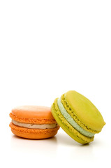 Delicious Isolated Orange and Green Stacked Macarons