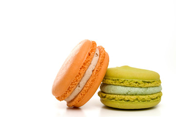 Delicious Isolated Orange and Green Stacked Macarons