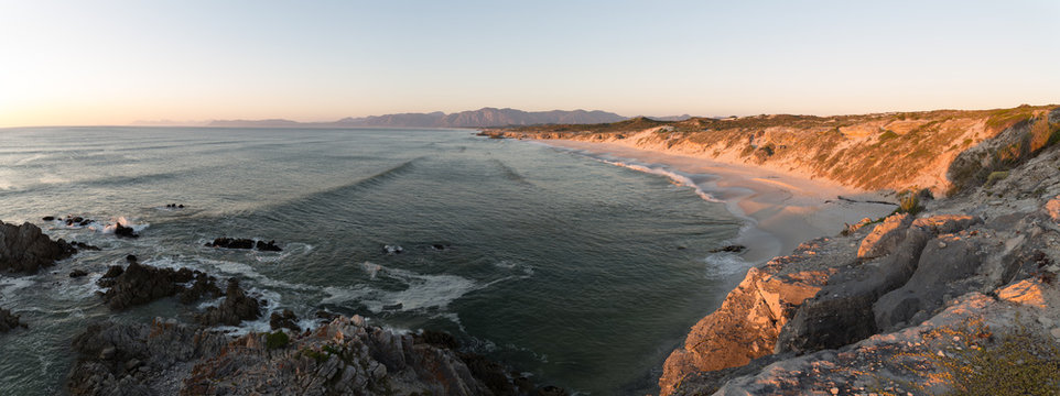 Wide angle panoramic view over the walker bay nature reserve along the overberg coastline in south africa